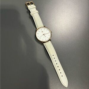 Rose gold and gray boulevard MVMT watch